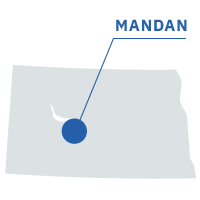Outline of the state of North Dakota with Mandan denoted