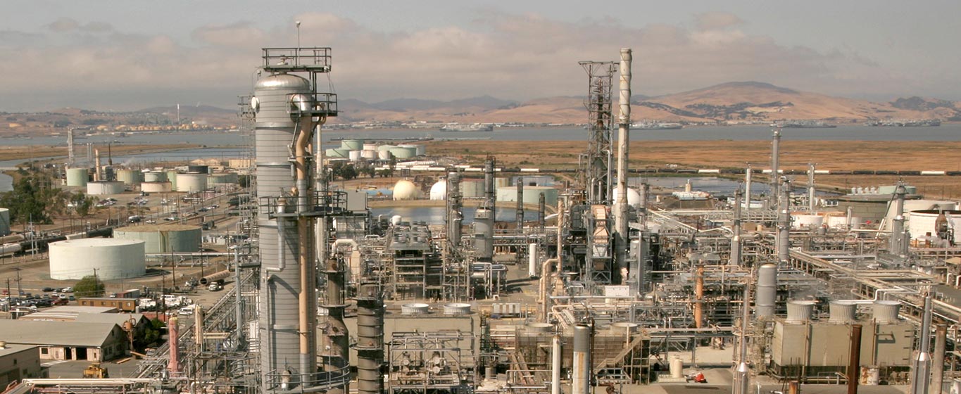 Martinez Refinery from an aerial perspective with mountains in the background